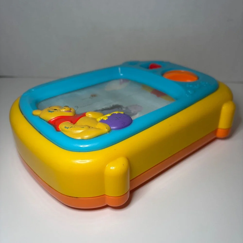 Disney Winnie the Pooh Musical Wind Up Toy TV Scrolling Screen Eeyore Yellow